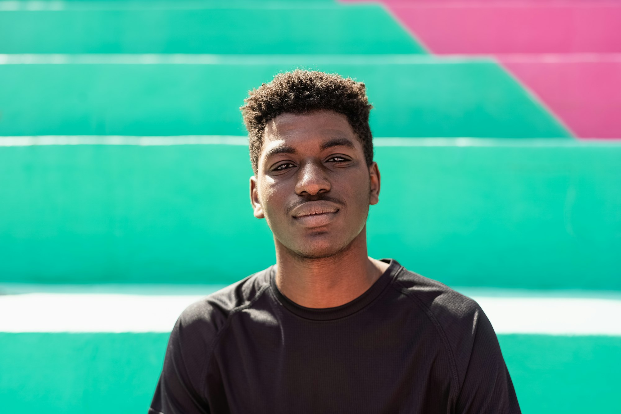 Young African teenager looking in front of camera